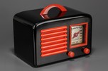 Striking Continental Radio in Black Bakelite + Red Trim